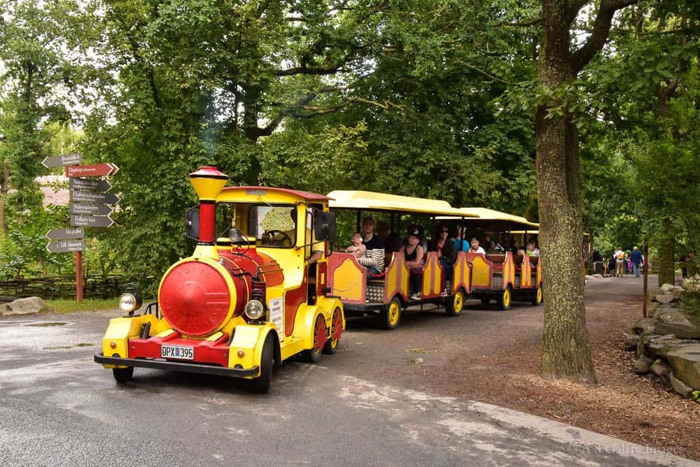 Small train carrying people around Scansen open air museum Small train carrying people around Scansen open air museum