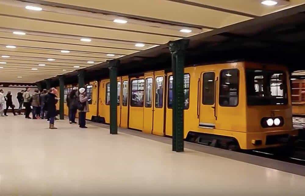 view of the Millennium metro entering the station in Budapest view of the Millennium metro entering the station in Budapest